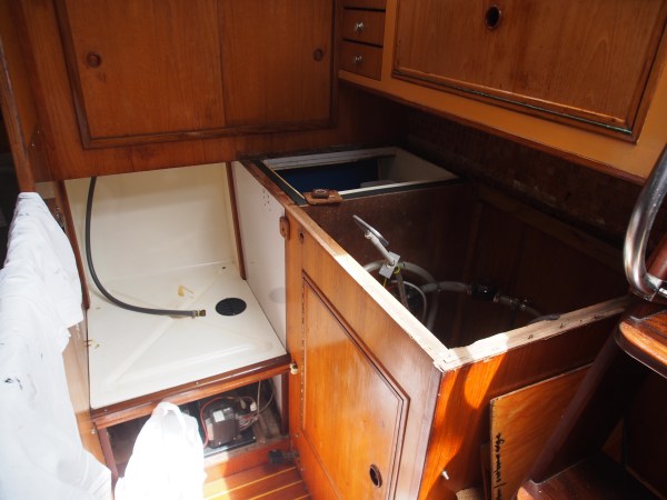 The galley countertop is now off exposing the icebox