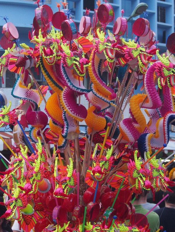 Lots of colour, fireworks, costumes, masks and of course the dragons