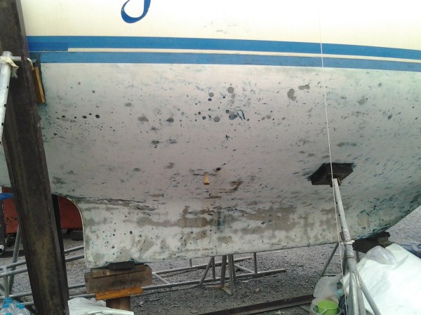 Another view after all the anti fouling has been removed and what remains is an old 'barrier coat' to protect the fiberglass