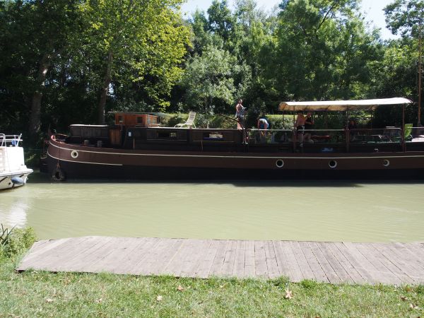 One of the converted old barges now used for tourist travel on the canal