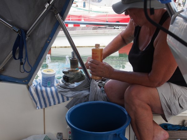 Connie learning the finer points of winch maintenance and doing a great job