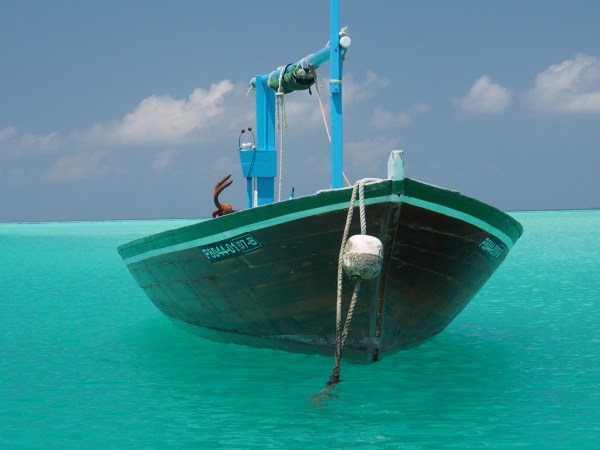 Quintessential photo of a Maldivian boat at anchor