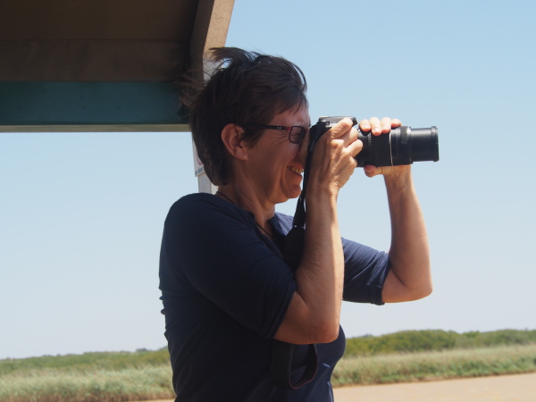 Kirsten spotting another rhino on the river