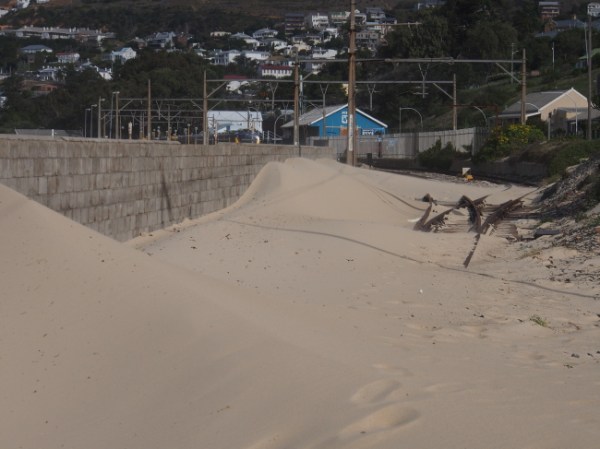 The day this picture was taken it was a blustery day with the sand driven completely across the railway lines stranding two trains in the Simon's Town railway station