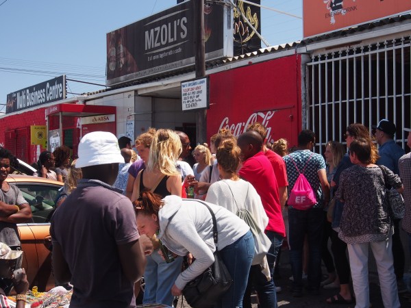 Lining up outside the shop smelling the braii and salavating and waiting for our turn to order
