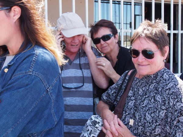 Gary, Angela and Vereena trying to see if they can phone in their order to avoid the lineup