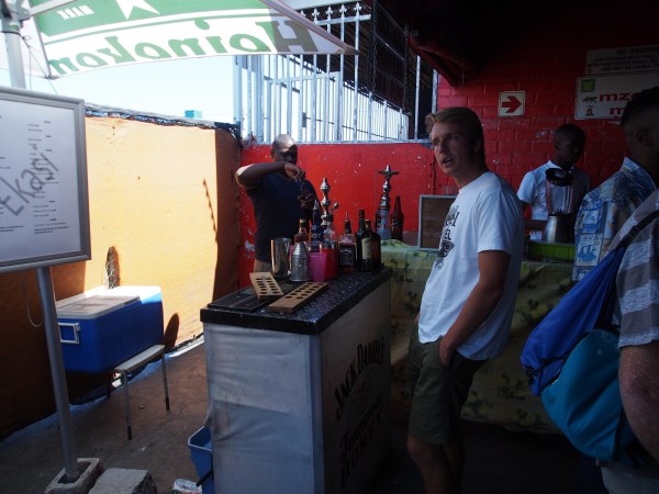 The bar. Only one customer. Not many are drinking anything but a few beers.